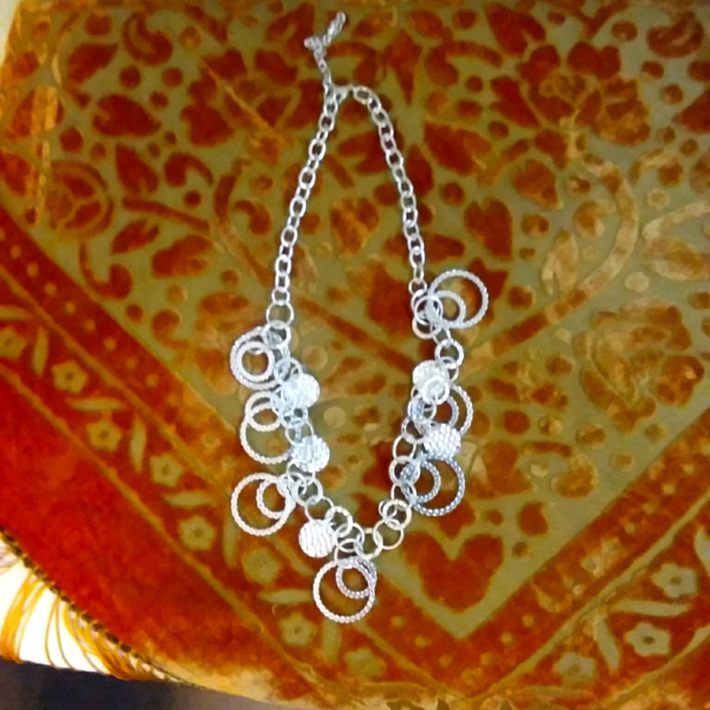 Pretty silver dangle necklace.